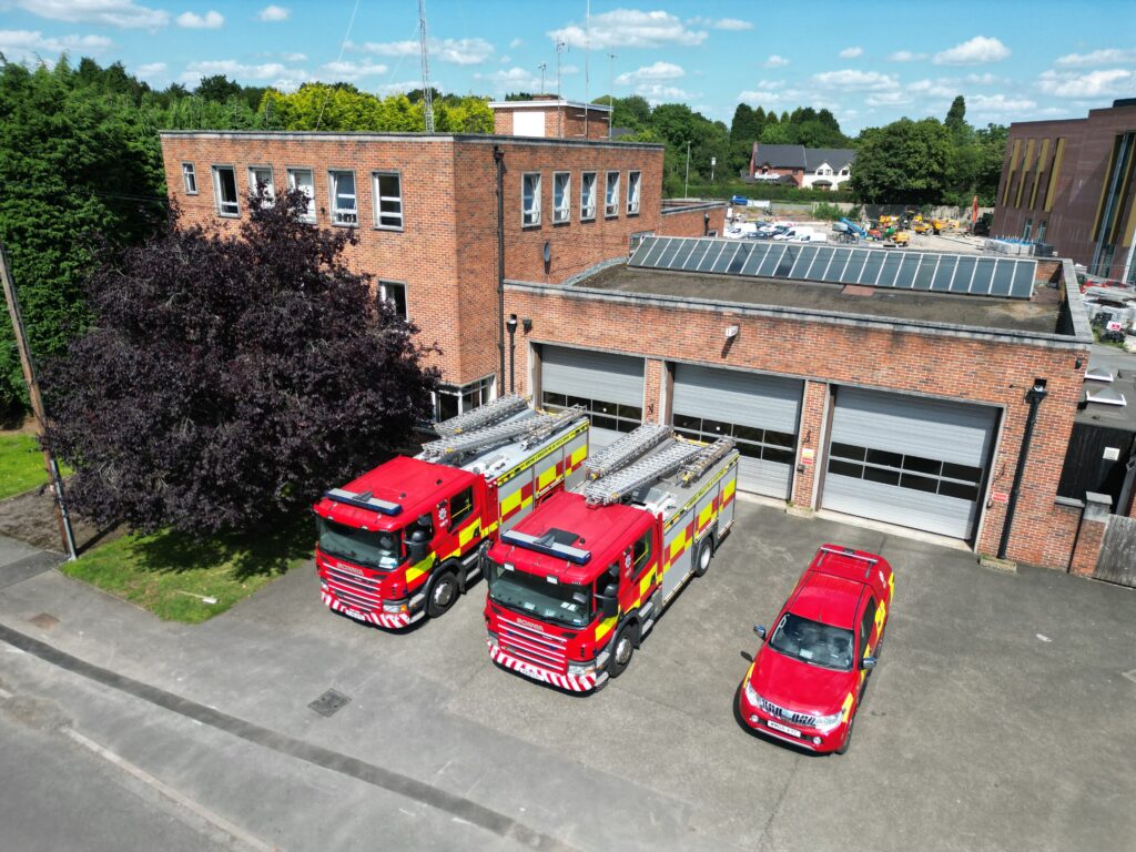 3 fire vehicles at fire station from above
