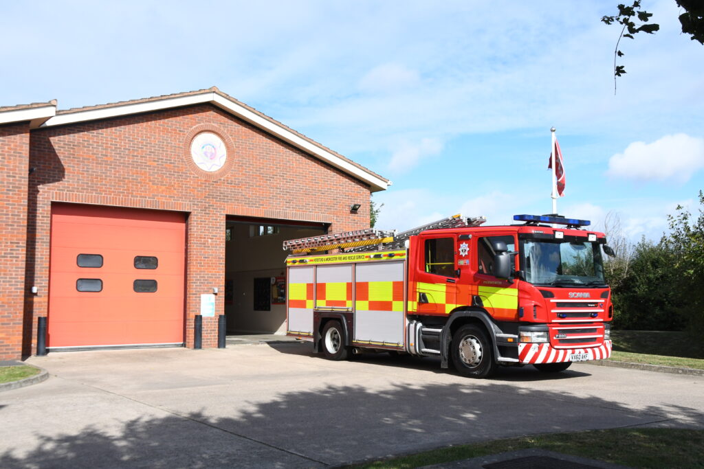 Fire engine in front of fire station