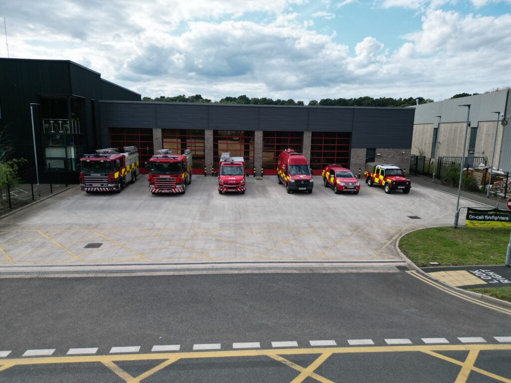 Fire vehicles lined up at front of fire station
