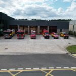 Fire vehicles lined up at front of fire station