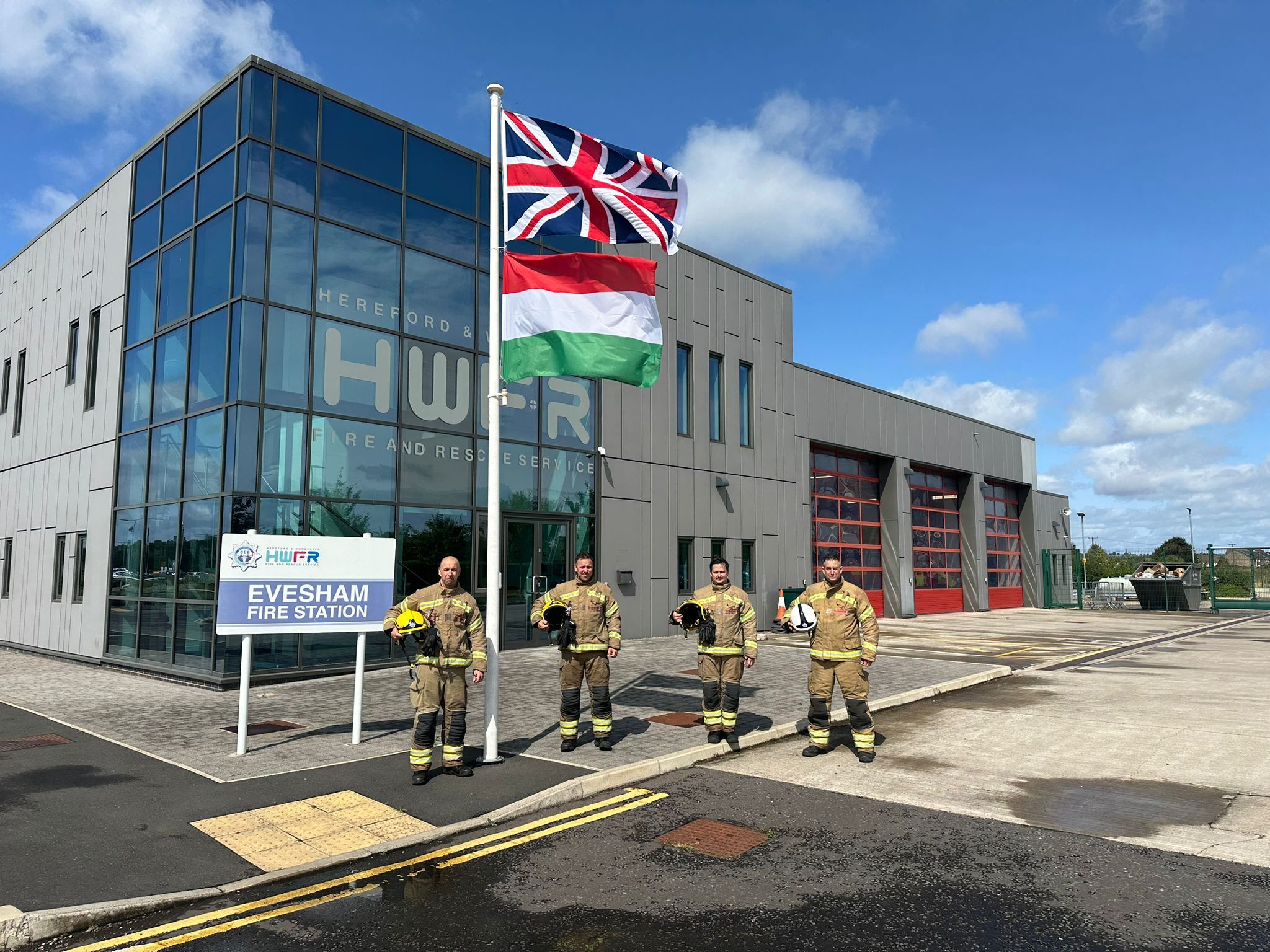 Flags flying at fire station